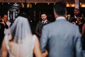 a groom sees his bride for the first time