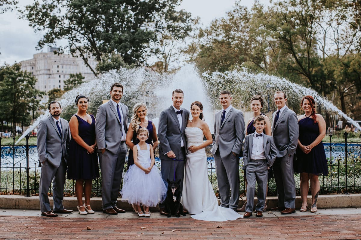 bridal party in front of Franklin square fountain