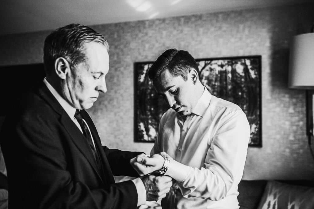 photos of groom getting ready